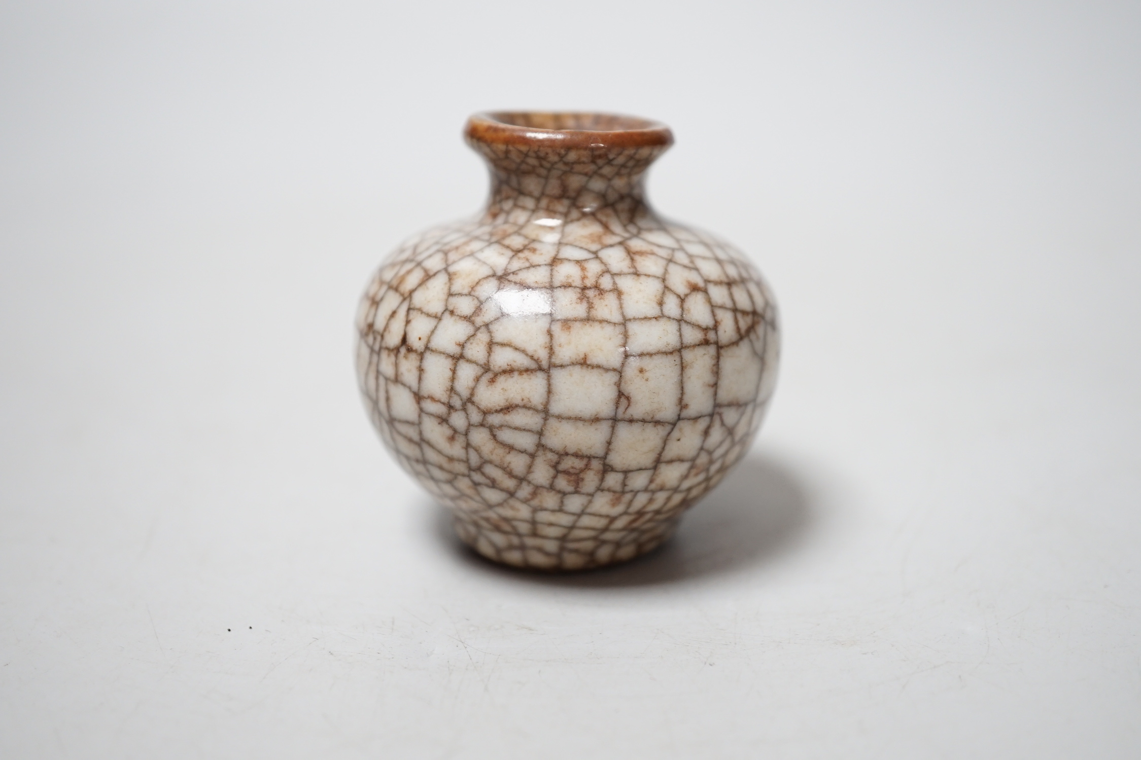 A Chinese crackle glazed small jar, 5.5cm high